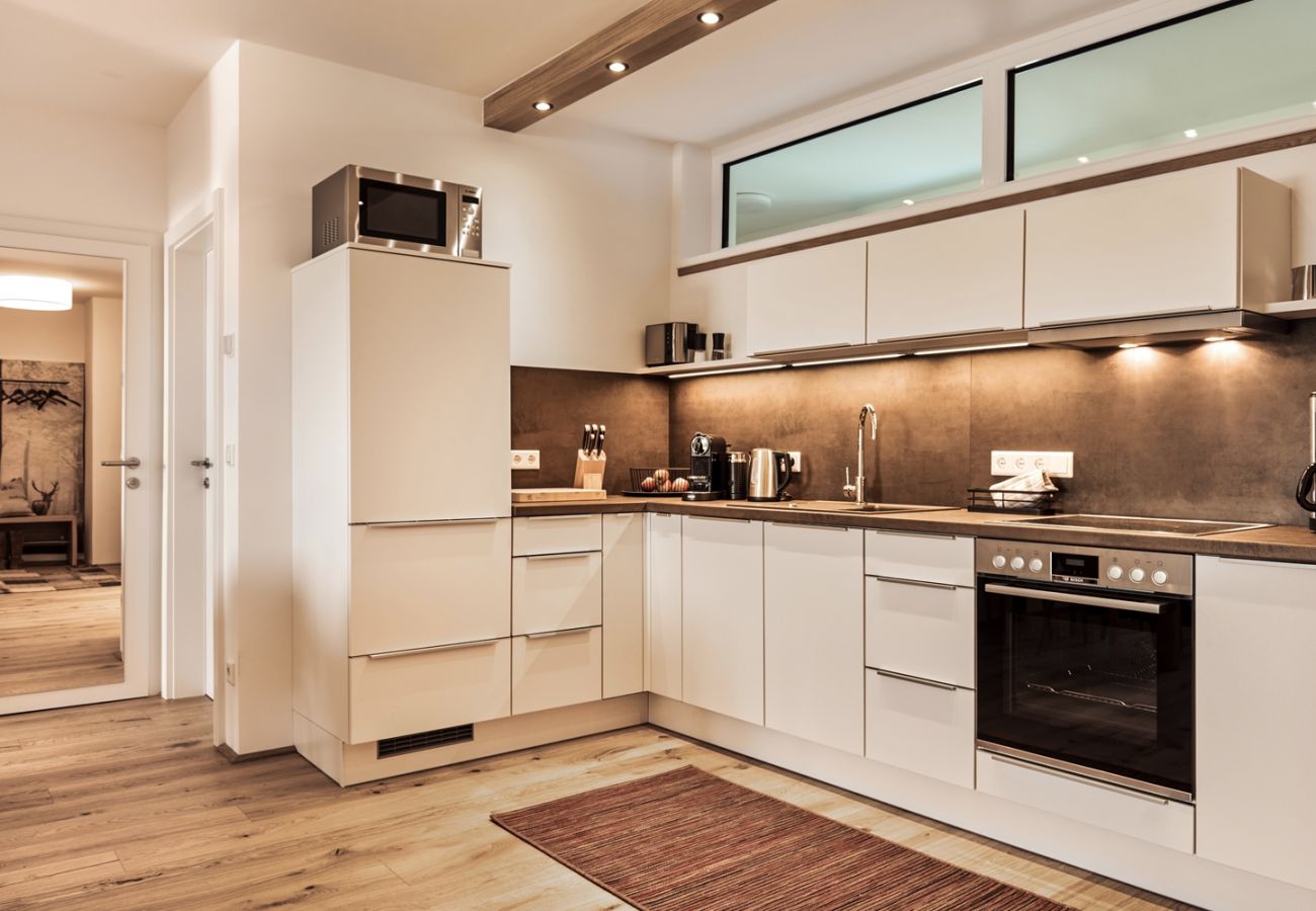 Küche in der Ferienwohnung Wasserfall Lodge C2 in Tauplitz