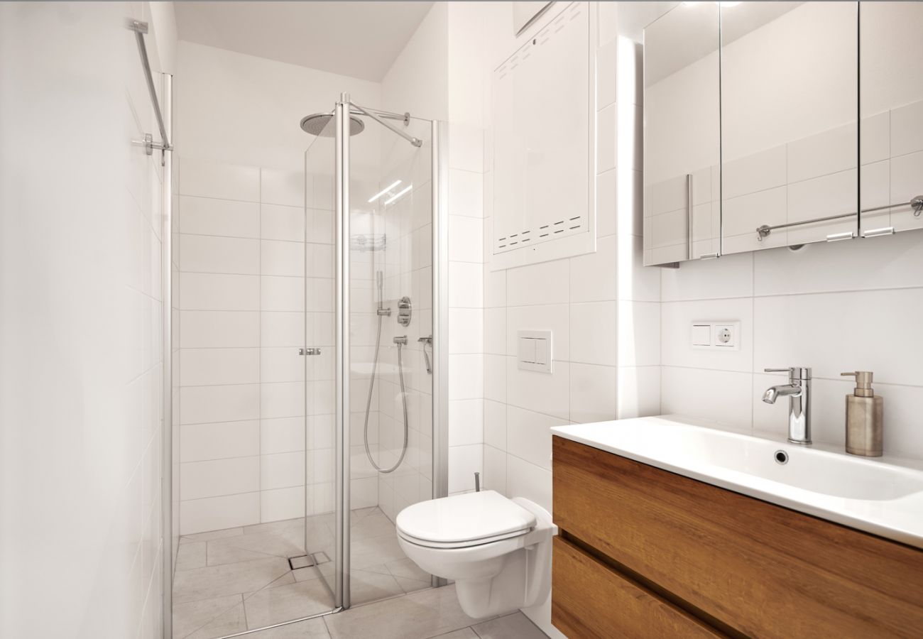 Badezimmer mit Regendusche in der Ferienwohnung Adler Lodge D5 in Tauplitz